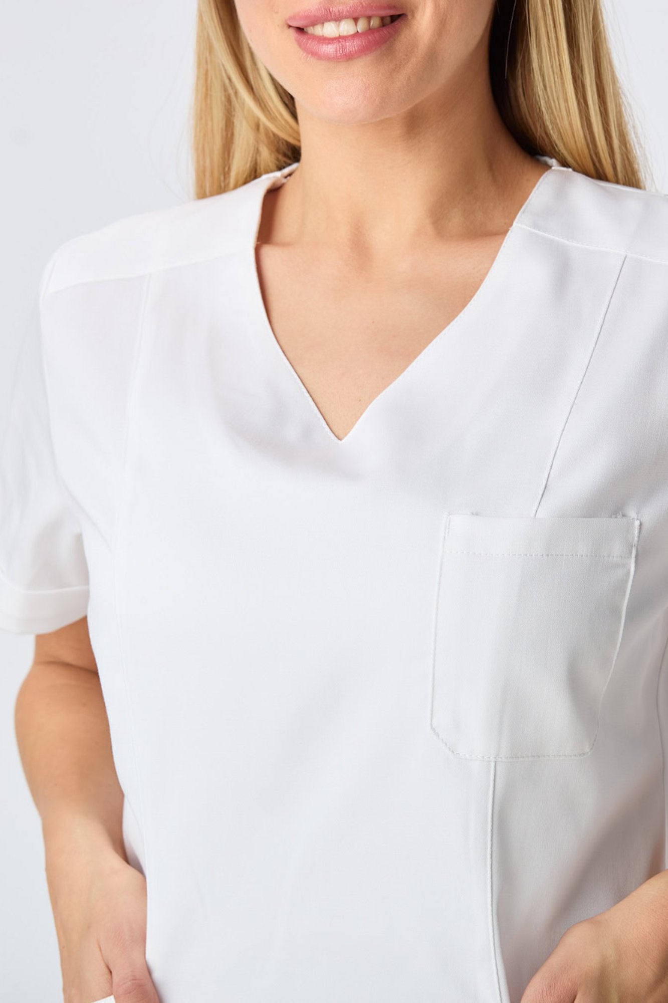 emanno-still-cotton-bela-detalj